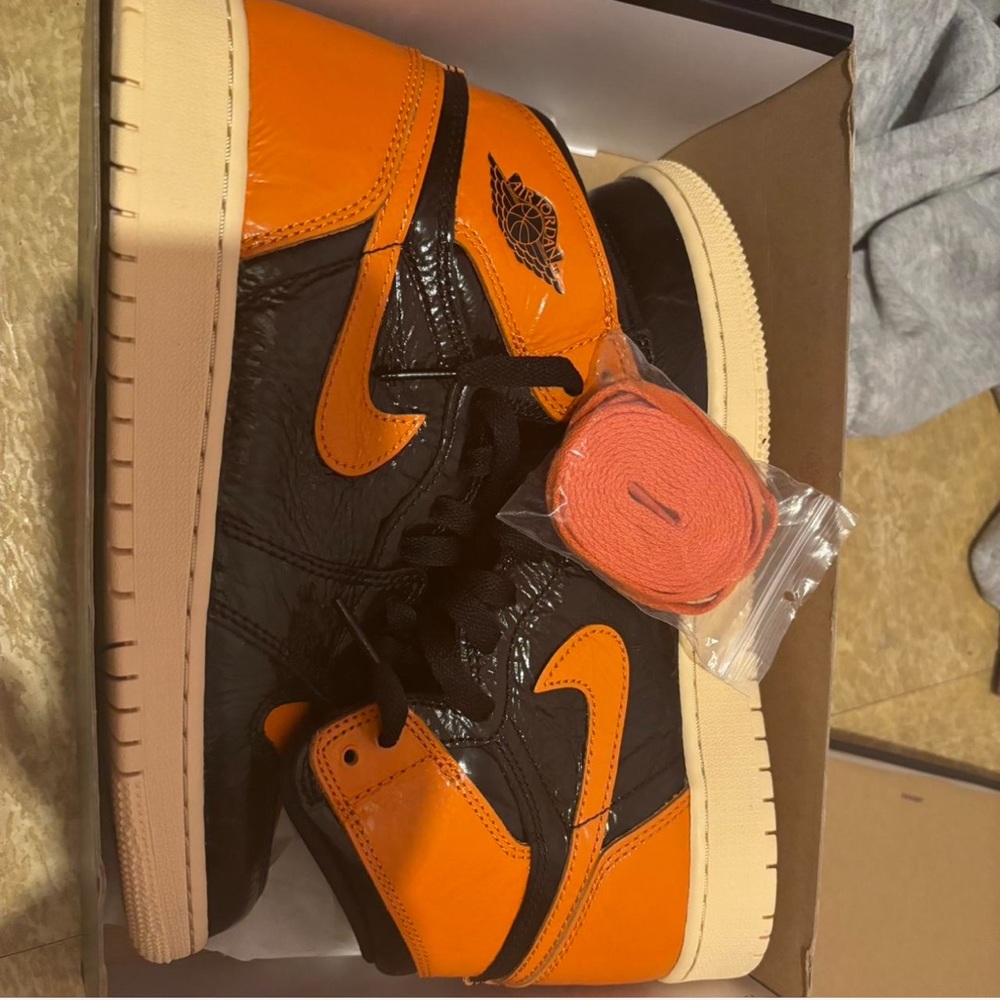 Air Jordan High-Top Sneakers in Black and Orange